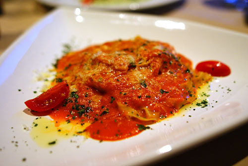 Handmade Fettuccini Pomodoro garnished with Aged Pecorino Romano Cheese