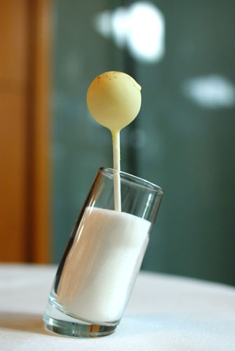 white chocolate, mango and cardamom lollipop