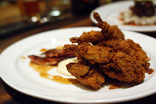 quail fry, grits, chard, slab bacon, maple jus