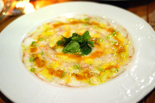 Carpaccio di Branzino e Ricci di Mare