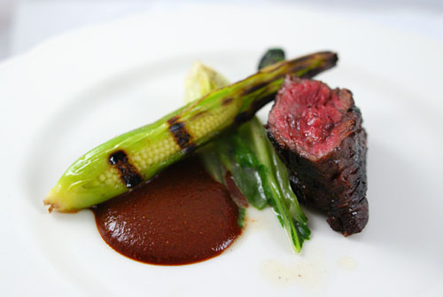 Marinated Hanger Steak, Crunchy Escargot, Baby Corn, Bok Choy & Black Olive Mole