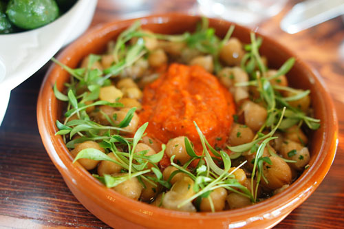 Slow cooked chickpeas a la Catalan, sauce romesco, coriander