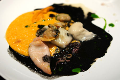 fuck bp. uni 'polenta'. squid. uni. oyster. fluke. mussel. clam. squid ink dashi 'sludge'. parsley oil. clam mussel juice reduction.