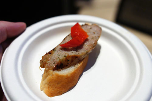 Rattlesnake & Rabbit Sausage with Sweet Peppers on Bread Medallions