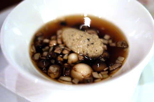 Oxtail consommé, mushroom royal, black truffles