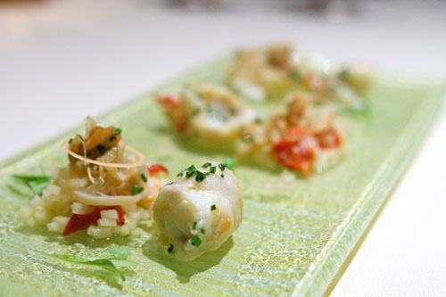 Butter Poached King Crab with Giant Clam, Green Papaya Salad, Caviar Lime and Fresh Yuzu