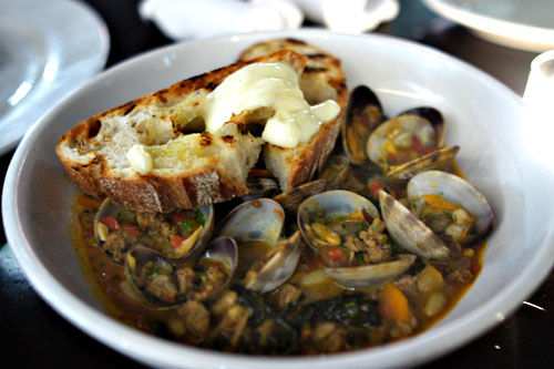 house-made chorizo and braised clams, shell beans, black kale, grilled bread and aioli