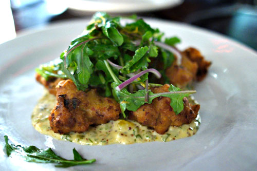 oyster and pork belly beignets, remoulade and arugula