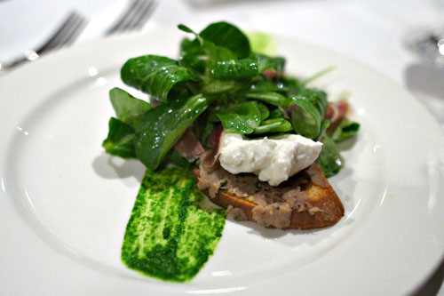 Duck salad with mache lettuce, duck prosciutto, and fresh ricotta cheese