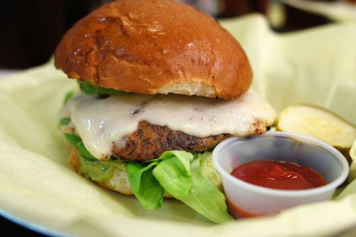 O.C., turkey burger, herb sauce, sprouts, marinated carrots, avocado, provolone