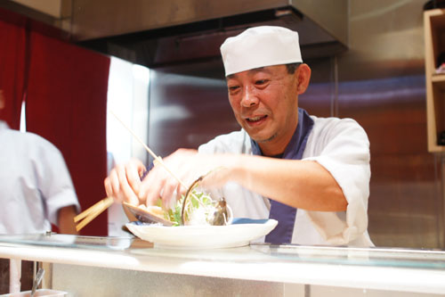 Ken-san plating a sashimi platter
