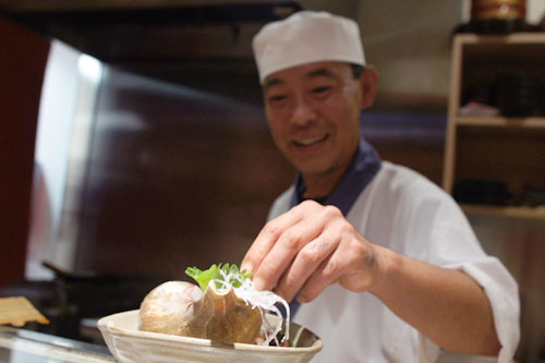 Ken-san plating the conch