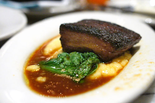 Crispy Niman Ranch Pork Belly with Soft Polenta, Bitter Greens & Apple Cider