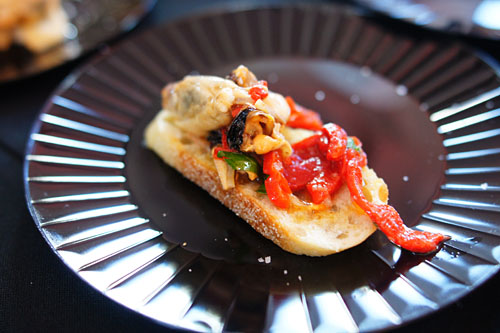 Tostada of House Conserved Carlsbad Mussels, Roasted Piquillo Peppers, Shallots, Crushed Garlic, 25 yr Sherry Vinegar, Lemon Essence & Oleostepa Oil