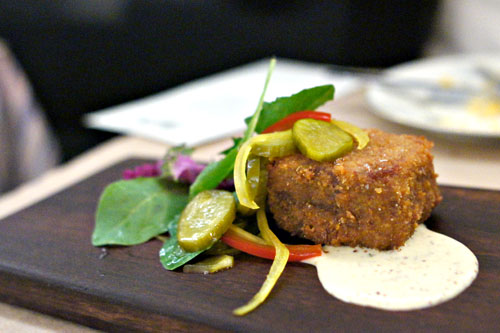 country pork fritter, bread & butter pickles, hot mustard dressing