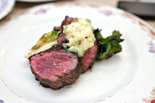 hanger steak, anchovy and olive butter, charred escarole