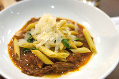 Oven Roasted Penne with Short Rib Bolognese, Arugula and Shaved Parmesan