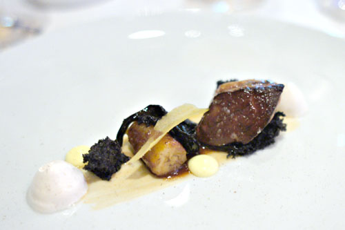 Seared Hudson Valley foie gras with banana flambé, sauce Hollandaise, Black Trumpet mushrooms, and warm brandy meringue