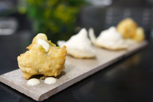 Seaweed beignet, yuzukosho and lime + Onion chicharron, smoked creme fraiche