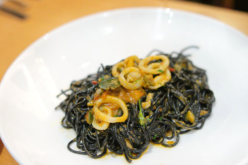 spaghettini nero, sea urchin, squid puttanesca & fried capers