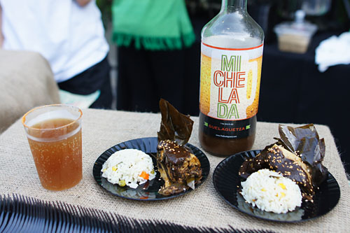 Tamales Oaxaqueños: Black Mole and Chicken Breast Tamales wrapped in Banana Leaf / Michelada