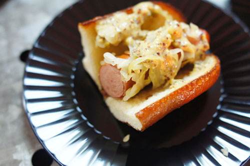 Pretzel Pup, Smoked Beef & Bacon Link, Sauerkraut, Grainy Mustard, Pretzel Bun