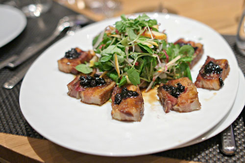 Maple Glazed Pork Belly, Asian Spices, Watercress, Sesame-Orange Dressing, Wild Huckleberry Compote