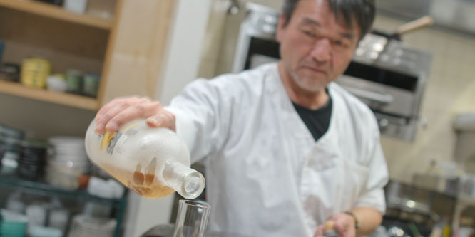 Yama-san Pouring Scotch