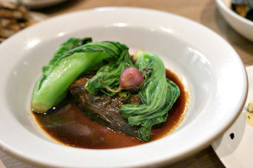 caramel braised kurobuta pork belly, radish, mustard greens