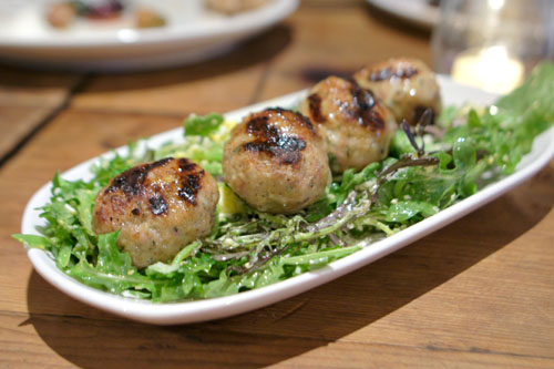 Grilled pork meatballs, snap peas, pecorino, bitter greens