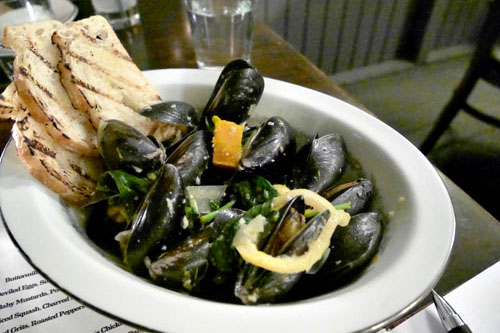 Mussels with Berbere Spiced Squash, Charred Leek, Bloomsdale Spinach & Meyer Lemon Confit