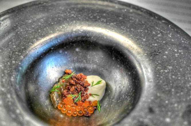 ember roasted chicken consommé, trout roe & shallot