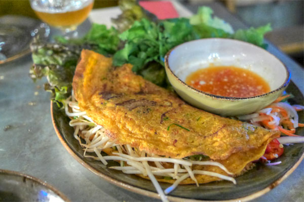 vietnamese crepe, 'banh xeo', pork belly, prawns, bean sprout, herbs n' greens, house dressing