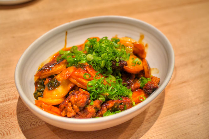 Spicy rice cake, chorizo, pickled mustard green