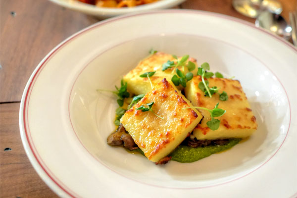 Baked Semolina Gnocchi with Wild Mushroom Ragu, Spring Onion & Hazelnut Pesto