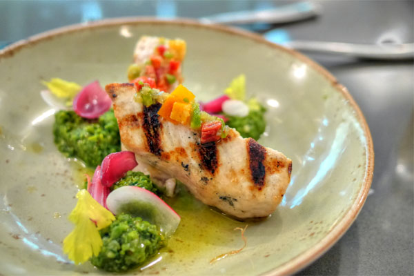 Swordfish, pea harissa, red onion, radish