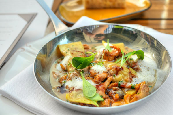 Agnolotti of Suckling Pig, Golden Chanterelles, Bonati Parmigiano