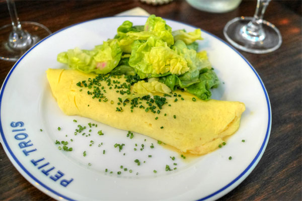 Omelette, chives, Boursin cheese, Boston lettuce, Dijon vinaigrette