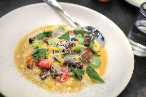 anson mills rosebank grits, cherry tomato, king trumpet mushroom, corn, basil