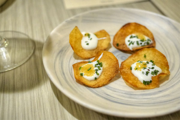 Potato chips with whitefish roe and crème fraiche
