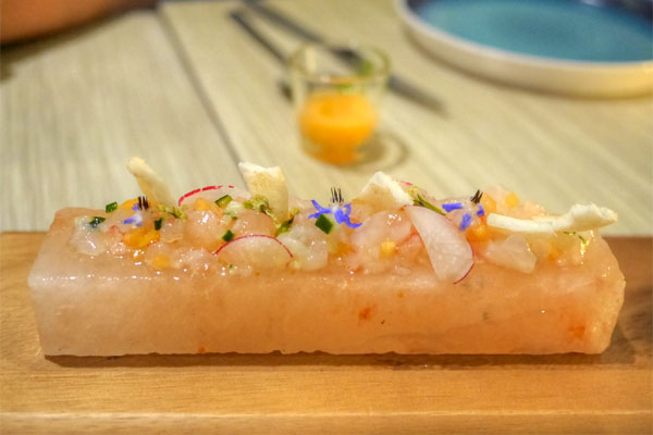 Santa Barbara spot prawn tartare with market melons, burnt orange oil and pink salt