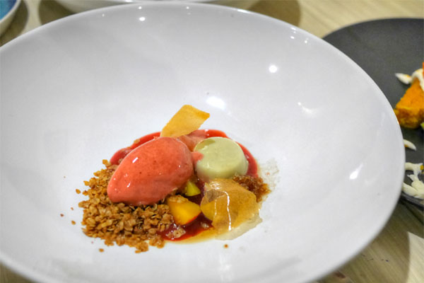 Anise hyssop panna cotta with plums, coffee granita and almond-oat crumble