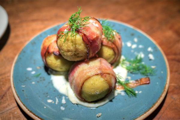 Bacon wrapped Matzoh balls, horseradish, dill aioli