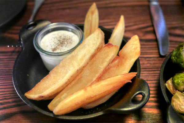 yukon gold wedge fries, chive crème fraiche