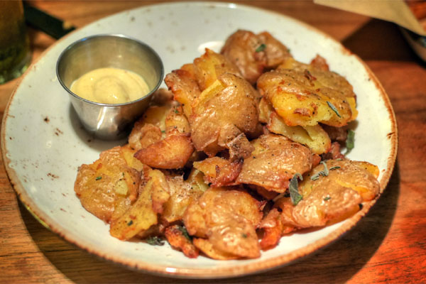 Yukon Gold Tostones with Sage & Tangy Aioli