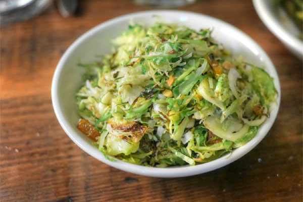 Shaved Brussels sprouts, roasted almond, caper, dried apricot salad