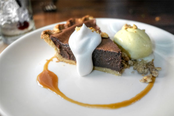 Chocolate pie, rye crust, Spanish peanut crumble, vanilla-malted ice cream