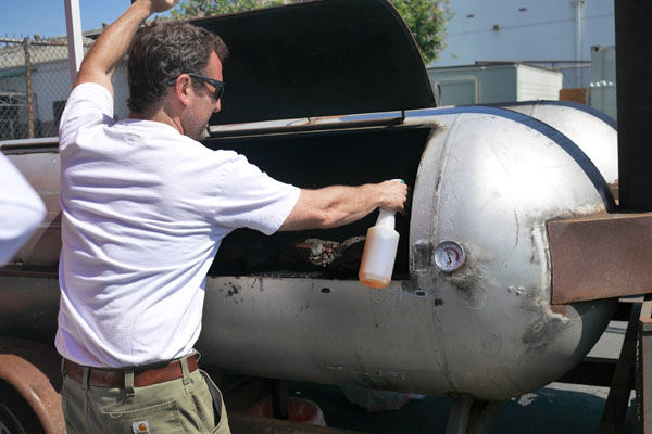 Adam Perry Lang Spraying Brisket