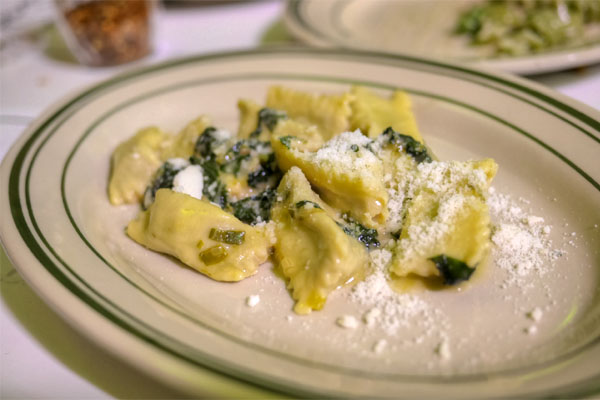 lamb agnolotti, green garlic, mustard greens, pecorino