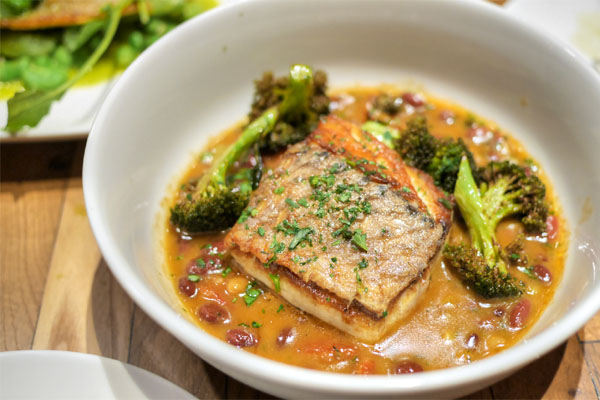 wild striped bass, rancho gordo beans, broccoli, tomato confit, sherry beef jus